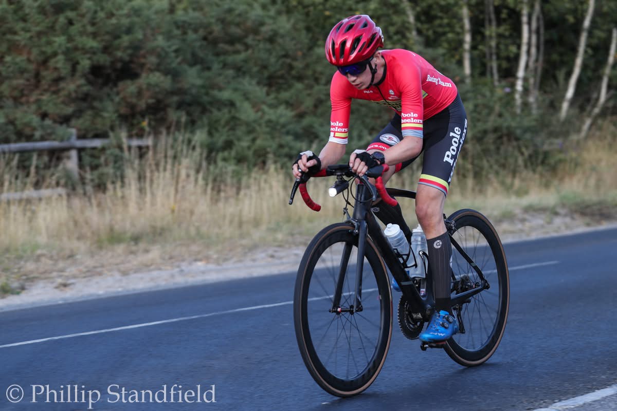 Robert Fall wearing a helmet while cycling